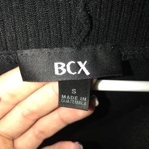 Black sweater size small. Never worn